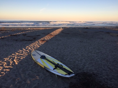 Paddleboard on sand